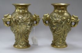 A pair of Chinese bronze 'dragon' vases height 24cm