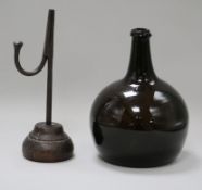 An 18th century rush light and early Dutch bottle rush light 24cm