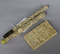 A Chinese ivory carved card case and two parasol handles