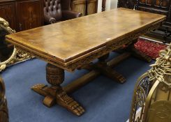 A 17th century style oak draw leaf dining table