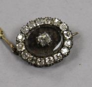 A William IV yellow metal and diamond set mourning brooch, inscribed en verso 'I.H. Wilson, died