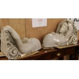 A pair large plaster figural brackets W.40cm approx.
