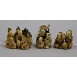 Three Japanese ivory groups of seated figures