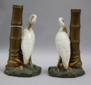 A pair of Royal Worcester heron and bamboo spill vases, pattern number, 852