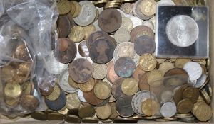 A large quantity of assorted coinage and a small group of buttons.