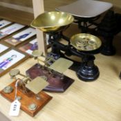 Two sets of kitchen scales and two postal scales