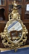 A 19th century ornate gilt wood wall mirror W:95cm