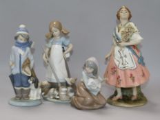 Three Lladro groups and a Nadal figure