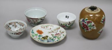 An 18th century Chinese famille rose 'tiger' saucer dish, a Batavia ware jar and three porcelain tea