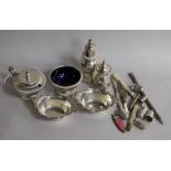 A group of silver including a three piece condiment set, London, 1962, sterling dishes, bookmark and
