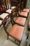 A set of four Regency style mahogany dining chairs