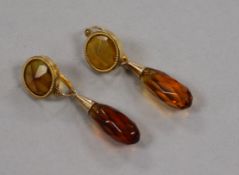 A pair of yellow metal and facetted amber drop earrings, 42mm.