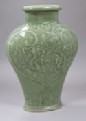 A Chinese celadon glazed vase height 18cm