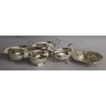 Four assorted silver sauceboats and a silver bonbon basket, 16 oz.