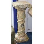 A carved and painted wooden stand W.27cm