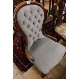 A Victorian mahogany buttoned back nursing chair