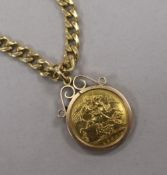 An Edward VII gold full sovereign in a 9ct gold pendant mounted, together with a 9ct gold curb