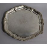 A 1930's silver salver by Walker & Hall, 26.8cm, 16.5 oz.