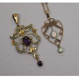 Two 9ct gold early 20th century gem set pendants including one on a yellow metal chain(a.f.).