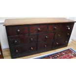 A Georgian mahogany side cabinet fitted ten drawers W.198cm