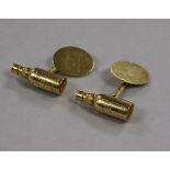 A pair of 14ct gold 'Wile Lemon Hart Rum' bottle shaped cufflinks.