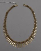 A stylish early 1960's 14ct gold fringe necklace, with pyramid shaped links, 41.5cm