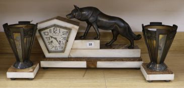 An Art Deco clock garniture clock width 46cm height 29cm