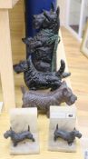 Three iron Scottish Terriers and book ends tallest 38cm