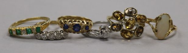 Six assorted gem set dress rings, 18ct(4) and 9ct(2).
