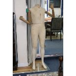 A modern articulated mannequin height 60in.