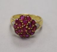 A 14ct gold and gem set cluster dress ring, size N/O.