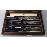 A 19th century rosewood cased drawing instrument set