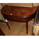 A Regency mahogany D-shaped folding top tea table W.91cm