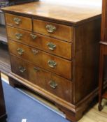 An early 18th century banded walnut chest of drawers W.91cm