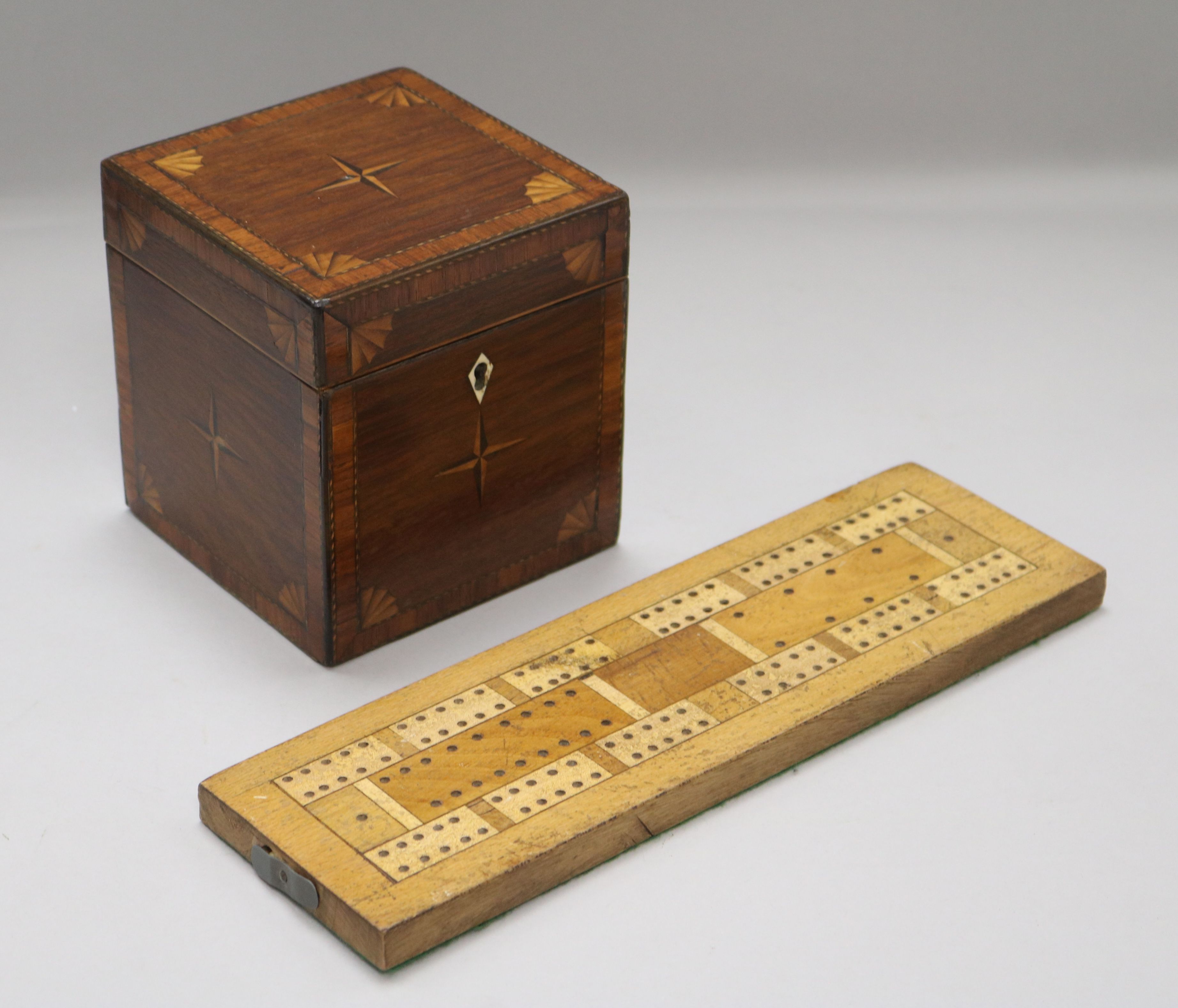 An inlaid tea caddy and a cribbage board caddy width 11cm height 13cm