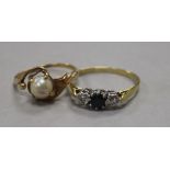 An early 20th century sapphire and diamond three stone ring and a 14ct gold and cultured pearl