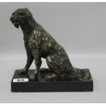 A 19th century bronze dog card holder, with hinged jaw width 17cm height 17cm
