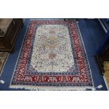 A Persian rug 180cm. x 125cm.