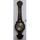 A 19th century Griffin & Hyams barometer made from oak from Royal Exchange fire 1838 W.26cm.