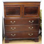 A George III mahogany chest with cupid top W.104cm