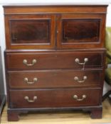 A George III mahogany chest with cupid top W.104cm