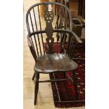 A Victorian ash and elm Windsor wheelback armchair