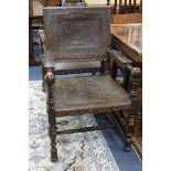 A pair of Spanish style elbow chairs W.65cm