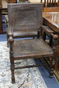 A pair of Spanish style elbow chairs W.65cm