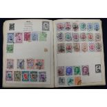 An album of World Stamps and stock books of German stamps