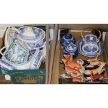 A collection of Staffordshire dogs plus small group of blue and white ceramics