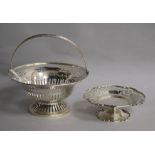 An Edwardian pierced silver fruit basket, Birmingham, 1907 and a small silver pedestal dish. 14.5