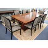 A burrwood dining table and eight chairs W.230cm