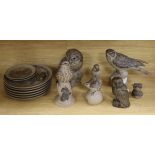 A collection of Poole pottery bird related models and plates and a Ken Norris resin owl