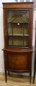 An Edwardian inlaid mahogany display cabinet, fitted single glazed door over cupboard, W 66.5cm